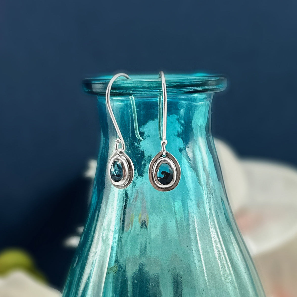 https://www.bethmillner.com/cdn/shop/files/blue-topaz-wave-earrings-no-1-silver-earrings-beth-millner-jewelry-ooak-894635_1200x1200.jpg?v=1704467648