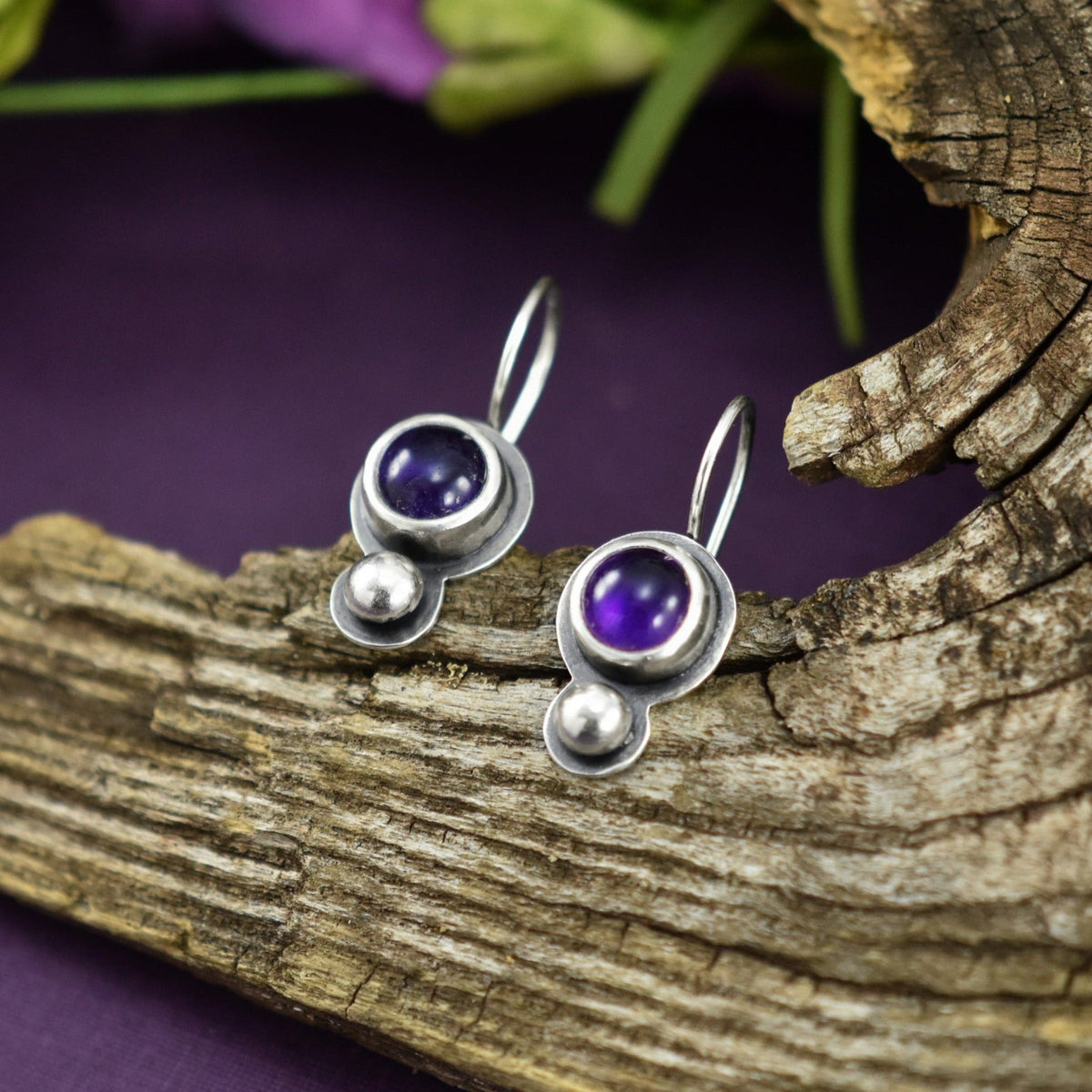 https://www.bethmillner.com/cdn/shop/products/amethyst-droplet-earrings-silver-earrings-beth-millner-jewelry-221041_1200x1200.jpg?v=1673038516